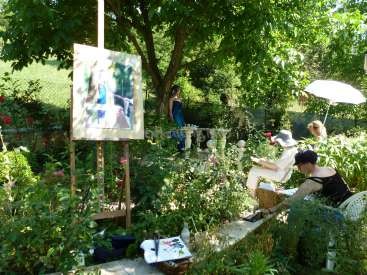 painting in the garden Three women painting in the garden